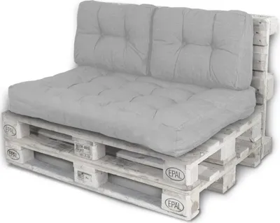 A set of light gray cushions for a pallet sofa, placed on white wooden pallets.