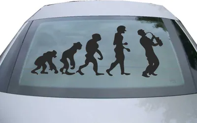 Produktbild von Indigos UG - Aufkleber Heckscheibe & Motorklappe DE7054 - schwarz - 600x236 mm - Evolution Trompetenspieler - Auto Scheiben Fenster Heckklappe Tuning Racing JDM - Die cut