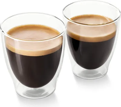 Two clear double-walled glasses filled with dark coffee and topped with crema, set against a white background.