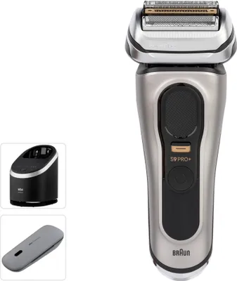 A studio shot of a Braun electric shaver and its accessories against a white background.