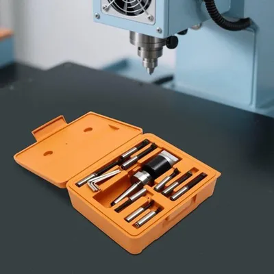 Imagen del producto de Boorkop de acero, 50 mm. Incluye 9 barras de extensión y un estuche de almacenamiento. Color: naranja