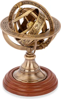 A brass armillary sphere on a wooden base.