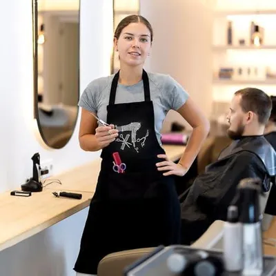 Produktbild von Friseurschürze mit zwei Taschen, verstellbar und wasserdicht für Friseure und Barbier