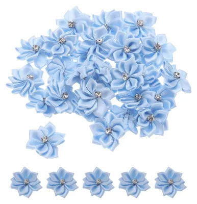 Immagine prodotto di 100 fiori di seta azzurri per decorazioni fai-da-te