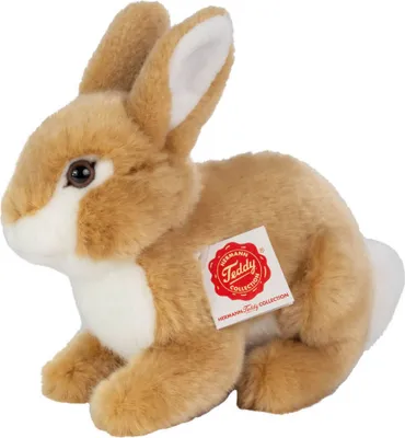 A plush toy rabbit is shown sitting on a white background.
