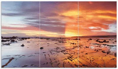 Produktbild von Wallario Herdabdeckplatte aus Glas, Größe 90 x 52 cm 3-teilig, Motiv Wattwanderung am Meer bei Sonnenuntergang