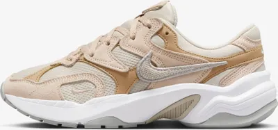 A side profile of a Nike AL8 sneaker in a light orewood brown colorway.