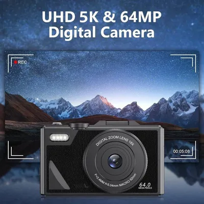 A digital camera is shown in front of a starry night sky with mountains.