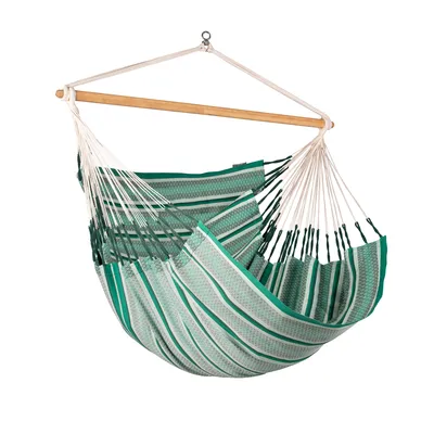 A hanging chair hammock with striped fabric.