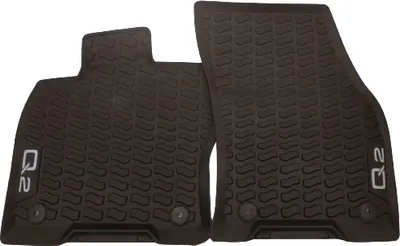 Two black rubber floor mats for a car, with a textured pattern and the "Q2" logo embossed on them.