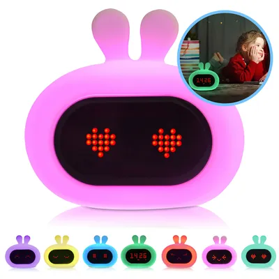Produktbild von Kadoing® Kaninchen Kinderwecker - mit Gesichtsausdruck und Tippfunktion - Aufwachlicht für Kinder - Schlaftrainer - Digitalwecker - Spielzeug Wecker