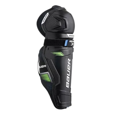 A black hockey shin guard with green and white accents, shown from the side against a white background.