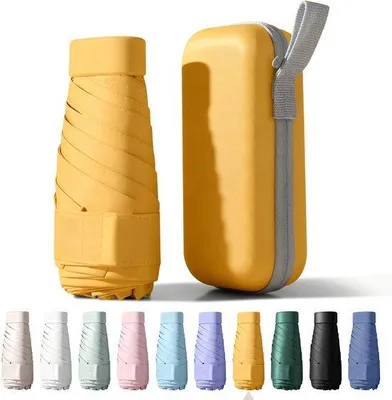 Imagen del producto de Paraguas de viaje compacto Unyqoos® con protección UV UPF 50, 6 refuerzos de metal, plegable, dimensiones 15 x 3,5 cm, peso 245 g, con elegante estuche tipo cápsula
