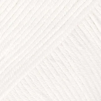 A close-up, textured view of white yarn.