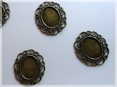 Produktbild von Vintageparts Fassungen oval Metalllegierung antik Bronze 24 x 18 mm, 3 Stück
