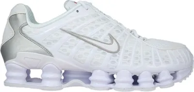 A white Nike Shox TL sneaker with silver accents.