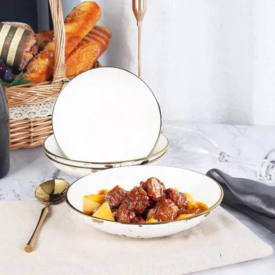 Produktbild von Porzellan-Pastateller Set 4 weiß mit Goldrand