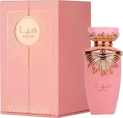 A pink perfume bottle and its matching box are displayed against a white background.