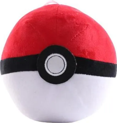 A close-up, centered shot of a plush Poké Ball toy.