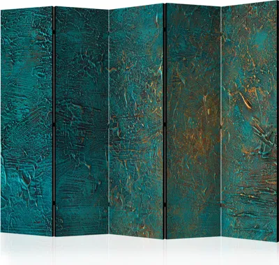 A room divider with a textured, abstract design.
