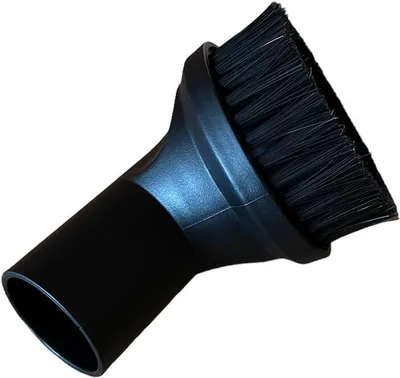 A close-up shot of a black vacuum cleaner brush attachment.