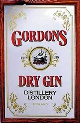 A framed mirror advertising Gordon's Dry Gin.
