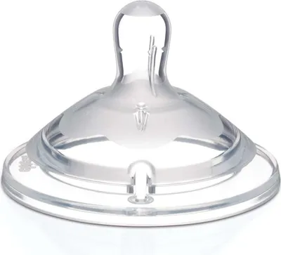 A close-up studio shot of a clear baby bottle nipple.