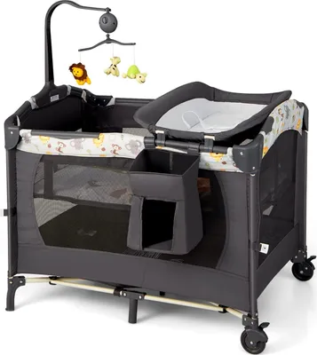 A product shot of a gray baby playpen with a changing table attachment and a mobile.