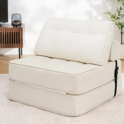 A white foldable sofa bed is shown in a room.