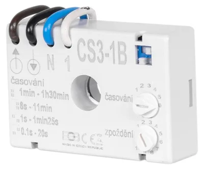 A white electrical timer relay device with wires connected.