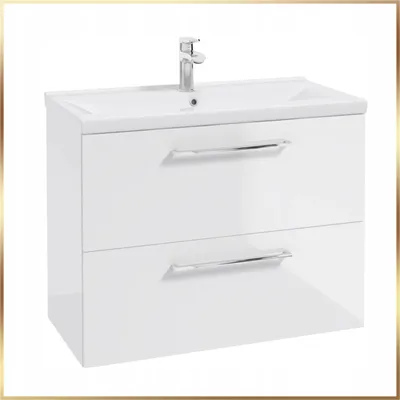 A white bathroom vanity with a sink and faucet.