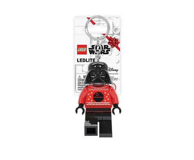 A LEGO Star Wars Darth Vader keychain with a festive sweater design, presented on a white background with packaging.