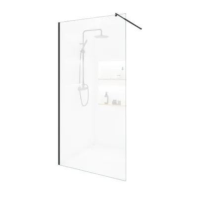 A shower enclosure with a shower head and shelves inside.