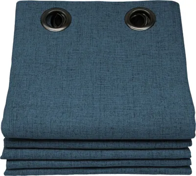 A folded stack of blue curtains with metal grommets at the top.