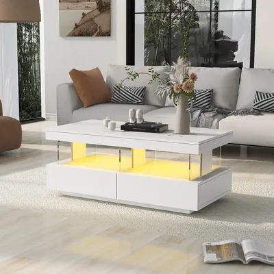 A modern living room scene featuring a white coffee table with LED lighting.
