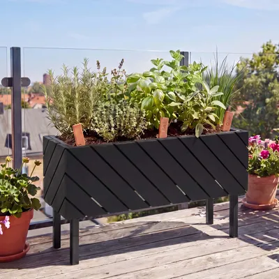 Image de Jardinière HWC-P87, bac à fleurs, pour l'intérieur et l'extérieur, en bois d'acacia ®, 36 x 62 x 22 cm ~ noir