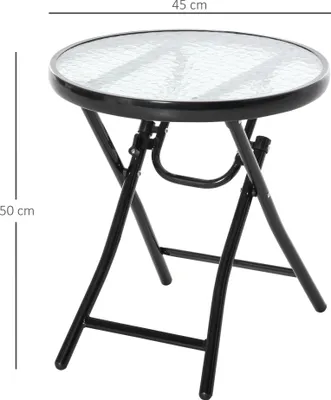 A round folding table with a glass top and black metal legs, shown from a side angle.