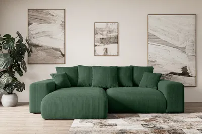 A modern green sectional sofa in a living room setting.