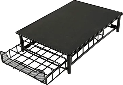 A black metal coffee pod organizer with a drawer pulled out.
