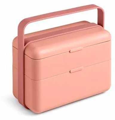 A pink lunchbox with a handle is shown against a white background.