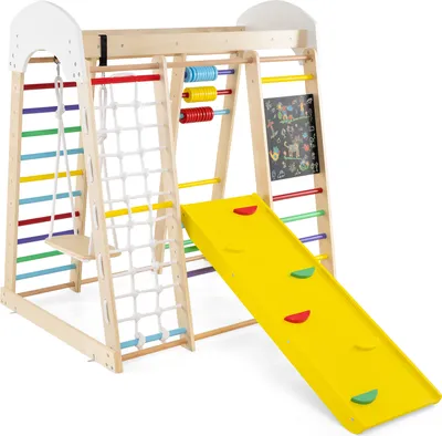 A wooden indoor playground structure for children, featuring various activities.
