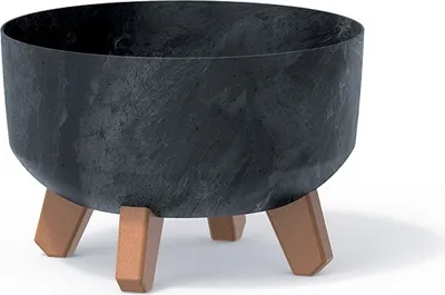 A dark grey planter with a textured finish sits on three brown legs against a white background.