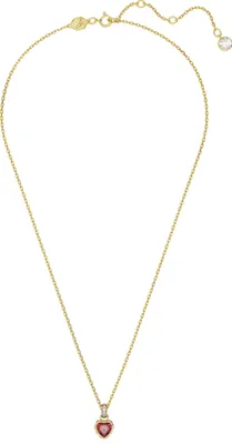 A gold necklace with a heart-shaped pendant.
