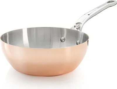 A copper sauteuse pan with a silver handle, shown against a white background.