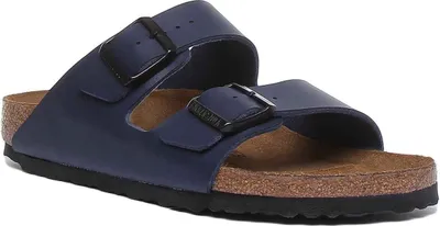 A pair of navy blue Birkenstock Arizona sandals with black buckles.