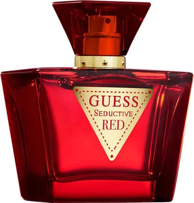 A red Guess Seductive Red Eau de Toilette bottle with a gold label.