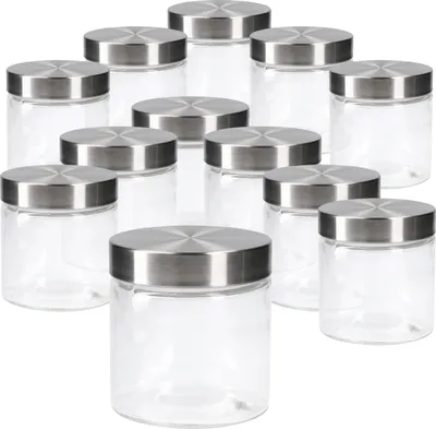A collection of glass jars with stainless steel lids arranged on a white background.
