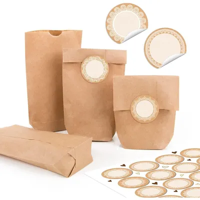 Produktbild von 24 kleine braune Papiertüten natur Kraftpapier 9 x 15 x 3,5 cm + 24 runde SCHÖN DASS DU DA BIST pink BUNT türkis blau grün gelb weiß Verpackung mini-Tüte GeschenkBlankoetiketten beige
