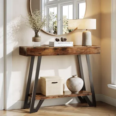 A console table with decorative items in a room.