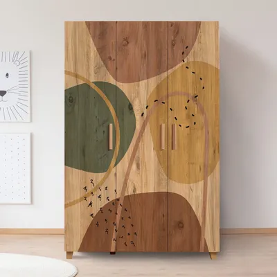 A wooden wardrobe with abstract art on its doors, standing in a room with two framed pictures on the wall.